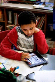 Photo of student with digital device